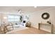 Airy living room with stylish furnishings, wood floors, and abundant natural light at 80 Sumner Nw Ave, Concord, NC 28027
