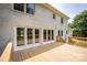 Spacious wooden deck that extends from the rear of the white brick home at 8337 Norcroft Dr, Charlotte, NC 28269