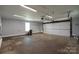 This garage offers ample storage space, a convenient work area, and potential for various projects or parking needs at 8829 Gelligum Dr, Charlotte, NC 28277