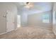 Spacious bedroom with neutral paint, plush carpet, and lots of natural light at 8909 Elkins Park Dr, Matthews, NC 28105