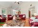 Spacious living room with hardwood floors, a vaulted ceiling, and an open layout at 1036 Foreman Ct, Denver, NC 28037