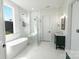 Contemporary bathroom with a soaking tub, glass-enclosed shower, and stylish vanity, creating a relaxing oasis at 108 Augusta Ln, Shelby, NC 28150