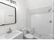 Modern bathroom features white subway tile, a glass-enclosed shower and sleek fixtures at 108 Augusta Ln, Shelby, NC 28150