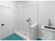 Modern bathroom featuring sleek white subway tile shower, stylish floors and vanity, offering a clean aesthetic at 108 Augusta Ln, Shelby, NC 28150