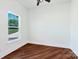 Cozy bedroom with hardwood floors and ample natural light, providing a comfortable living space at 108 Augusta Ln, Shelby, NC 28150