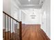 Open-concept living space with hardwood floors, modern lighting, and a spacious layout perfect for entertaining at 108 Augusta Ln, Shelby, NC 28150