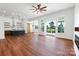 Open living space with hardwood floors, a kitchen island, and sliding doors leading to outdoor patio at 108 Augusta Ln, Shelby, NC 28150