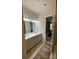 Bathroom featuring a double vanity and a door to the next room at 11608 Founders Park Ln, Pineville, NC 28134