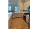 Modern kitchen featuring stainless steel appliances and plenty of cabinet space at 11608 Founders Park Ln, Pineville, NC 28134