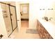Beautiful bathroom featuring a glass enclosed shower, granite countertops and a neutral-toned tile floor at 12209 Riceland Way, Midland, NC 28107
