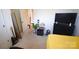 Bedroom with a door, guitar, tv, and carpet at 12209 Riceland Way, Midland, NC 28107