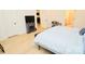 Comfortable bedroom featuring wood-look floors, an electric fireplace, and ample natural light at 12209 Riceland Way, Midland, NC 28107