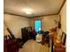 Bedroom needing TLC but offering a large closet and natural light at 12623 Levins Hall Rd, Huntersville, NC 28078