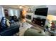 Cozy living room with a brick fireplace, hardwood floors, and comfortable seating area at 12623 Levins Hall Rd, Huntersville, NC 28078