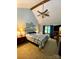 Spacious main bedroom featuring a vaulted ceiling, ceiling fan, and ensuite bathroom at 12623 Levins Hall Rd, Huntersville, NC 28078