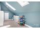 Playroom with neutral carpet and plenty of room for the Gathering to play at 149 Vista Bluff Ln, Mooresville, NC 28117