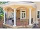 Covered patio offers an outdoor seating area with a ceiling fan and beautiful views at 149 Vista Bluff Ln, Mooresville, NC 28117