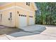 Spacious two-car garage boasts ample parking and natural light at 149 Vista Bluff Ln, Mooresville, NC 28117