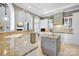 Open kitchen with stainless appliances, large island, breakfast bar and stone countertops at 149 Vista Bluff Ln, Mooresville, NC 28117