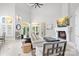 Bright living room features a fireplace, high ceilings, and large windows leading to a patio at 149 Vista Bluff Ln, Mooresville, NC 28117