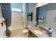 Bathroom featuring a shower-tub combo and granite countertops at 152 Asmodean Ln, Troutman, NC 28166