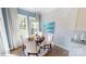 Charming dining area with hardwood floors and large windows for natural light at 152 Asmodean Ln, Troutman, NC 28166