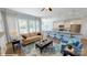 Bright and airy living room with hardwood floors and a modern kitchen in view at 152 Asmodean Ln, Troutman, NC 28166
