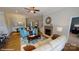 Inviting living room with a stone fireplace, comfortable seating, and an open layout at 152 Asmodean Ln, Troutman, NC 28166