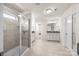 Bright bathroom with a glass shower, granite counters, and a neutral color palette at 15211 Colonial Park Dr, Huntersville, NC 28078
