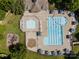 Aerial view of a community pool with lap lanes, pool, and lounge area, perfect for summer recreation at 15211 Colonial Park Dr, Huntersville, NC 28078