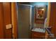 The RV bathroom features a shower, sink, and vanity for personal convenience at 155 Holly Harbor Trl, Mount Gilead, NC 27306