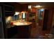 The RV kitchen features a sink, gas range, microwave, and ample cabinet space at 155 Holly Harbor Trl, Mount Gilead, NC 27306
