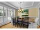 Formal dining area featuring natural light, chandelier lighting, and an open design at 18800 Boundary Oaks Ct, Davidson, NC 28036