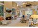 Inviting living room showcases a stone fireplace, built-in shelving, and neutral décor at 18800 Boundary Oaks Ct, Davidson, NC 28036