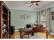 Office with custom wood shelving, an area rug, and a large desk at 18800 Boundary Oaks Ct, Davidson, NC 28036
