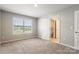 Bright bedroom featuring neutral paint, plush carpet, and an ensuite bathroom for added convenience at 2097 Saddlebred Dr, Iron Station, NC 28080