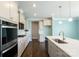 Beautiful kitchen with stainless steel appliances, granite countertops and light cabinets at 2097 Saddlebred Dr, Iron Station, NC 28080