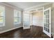 Bright and airy office space with hardwood floors and glass-paneled doors at 2097 Saddlebred Dr, Iron Station, NC 28080