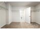 Generous walk-in closet with ample shelving and storage space, offering excellent organization solutions at 2097 Saddlebred Dr, Iron Station, NC 28080