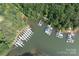 Aerial view of community boat docks and boat storage, providing convenient access to lake activities at 221 N Centurion Ln, Mount Holly, NC 28120
