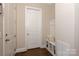 Functional mudroom area with built-in bench seating and storage cubbies for shoes and bags at 221 N Centurion Ln, Mount Holly, NC 28120