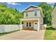Charming two-story home with a welcoming front porch and concrete driveway at 2662 14Th Ne St, Hickory, NC 28601