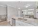 Stylish kitchen island with granite counters offering seamless connection to the living spaces at 2662 14Th Ne St, Hickory, NC 28601