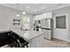 Bright kitchen featuring stainless steel appliances, granite countertops, and seating at the island at 2662 14Th Ne St, Hickory, NC 28601