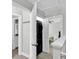 Upstairs laundry area with stacked washer and dryer at 2662 14Th Ne St, Hickory, NC 28601