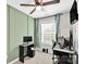 Office space featuring two computer setups, a ceiling fan, and carpeted floor at 2662 14Th Ne St, Hickory, NC 28601