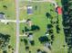Overhead view showcases the property, nearby homes, and landscape, highlighting its location within a residential neighborhood at 2694 Rock Dam Rd, Lincolnton, NC 28092