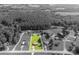 Aerial view of property highlighting lot size, surrounded by lush greenery and neighborhood at 2694 Rock Dam Rd, Lincolnton, NC 28092