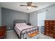 Bedroom with a comfy bed, ceiling fan, dresser, and natural light from the window at 2694 Rock Dam Rd, Lincolnton, NC 28092