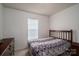 Cozy bedroom featuring wood bed frame and window with natural light at 2694 Rock Dam Rd, Lincolnton, NC 28092